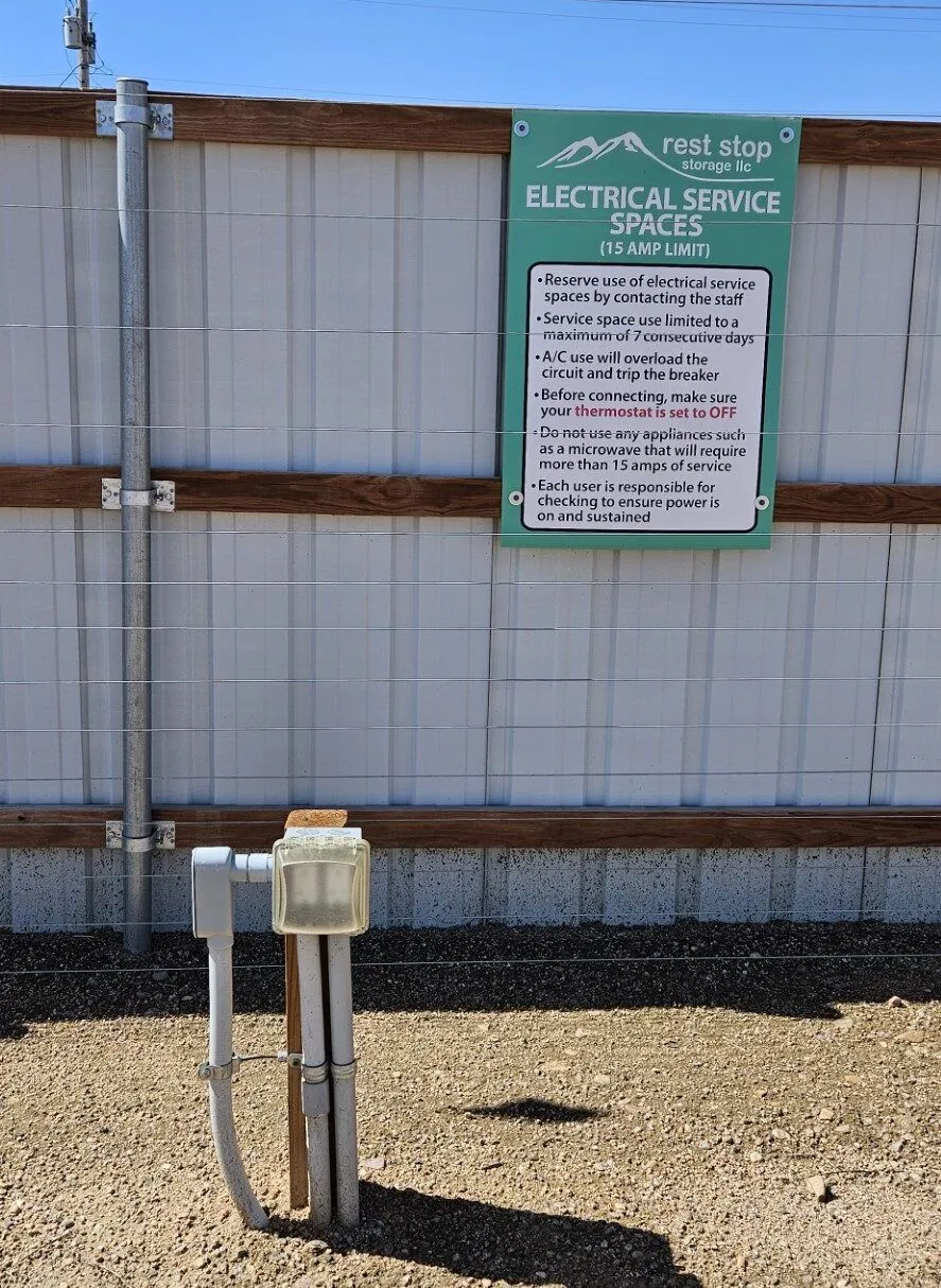 Temporary service bay for electrical hookup and maintenance